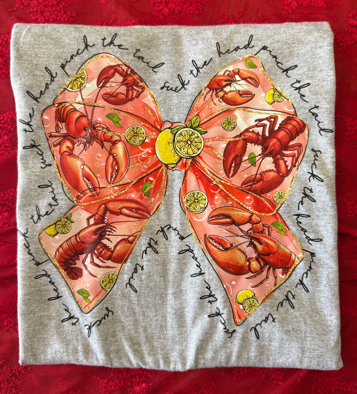 “Suck The Head Pinch The Tail” Bow Tee